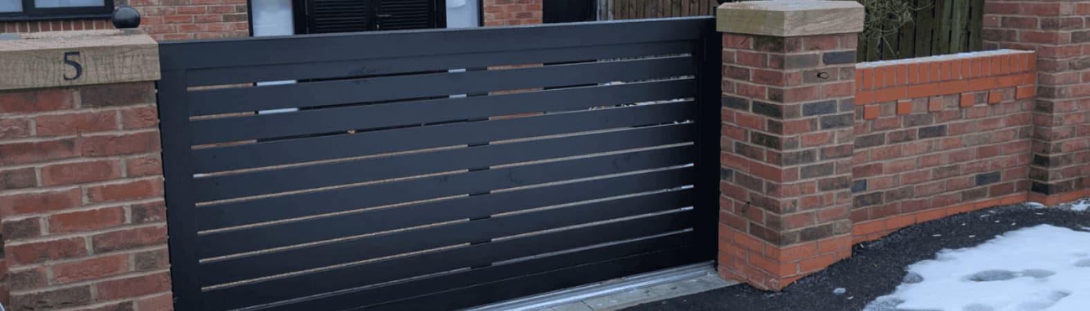 Do electric gates work well in snow and ice?